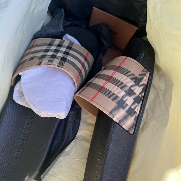 brand new burberry slides never worn 
size 10
